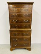 A REPRODUCTION MAHOGANY CHEST ON CHEST WITH BRUSHING SLIDE - W 70CM. D 40CM. H 155CM.