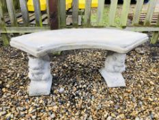A STONEWORK GARDEN SEAT SUPPORTED BY SQUIRRELS WIDTH 100CM.