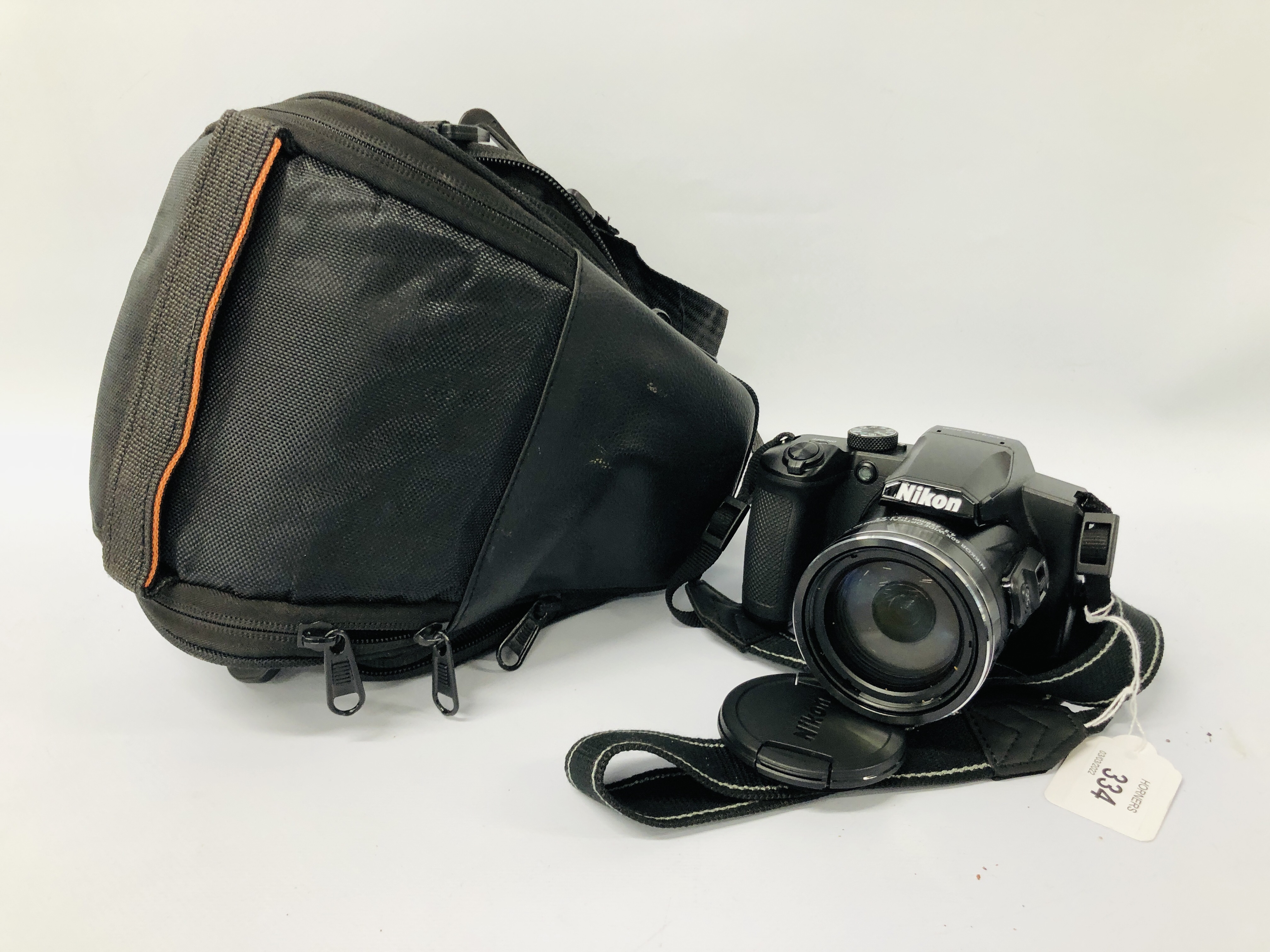 NIKON COOLPIX B600 DIGITAL CAMERA WITH CAMERA BAG AND CHARGER S/N 74001233 - SOLD AS SEEN.