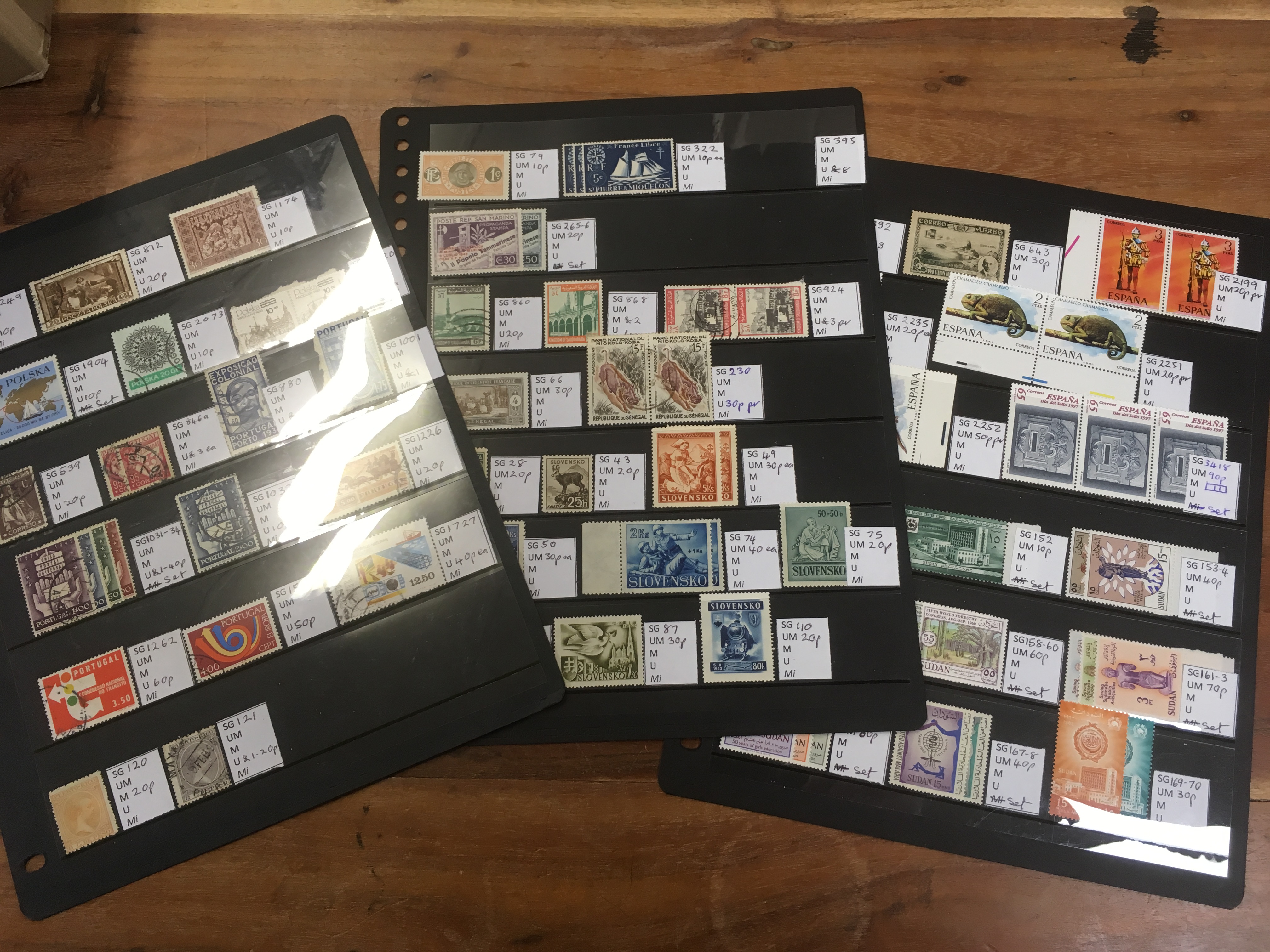 BOX OF FOREIGN STAMPS ON LEAVES AND STOCKCARDS, JAPAN, SWITZERLAND, MOZAMBIQUE, PORTUGAL, - Image 3 of 3
