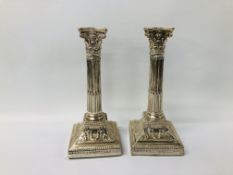 A PAIR OF SILVER CANDLESTICKS OF CORINTHIAN COLUMN FORM, FILLED, RUBBED MARKS ILLEGIBLE,