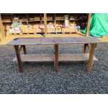 A WOODEN WORKSHOP BENCH LENGTH 230CM.