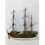 A MODEL WOODEN GALLEON LENGTH 85CM. HEIGHT 90CM.