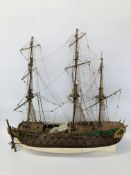 A MODEL WOODEN GALLEON LENGTH 85CM. HEIGHT 90CM.