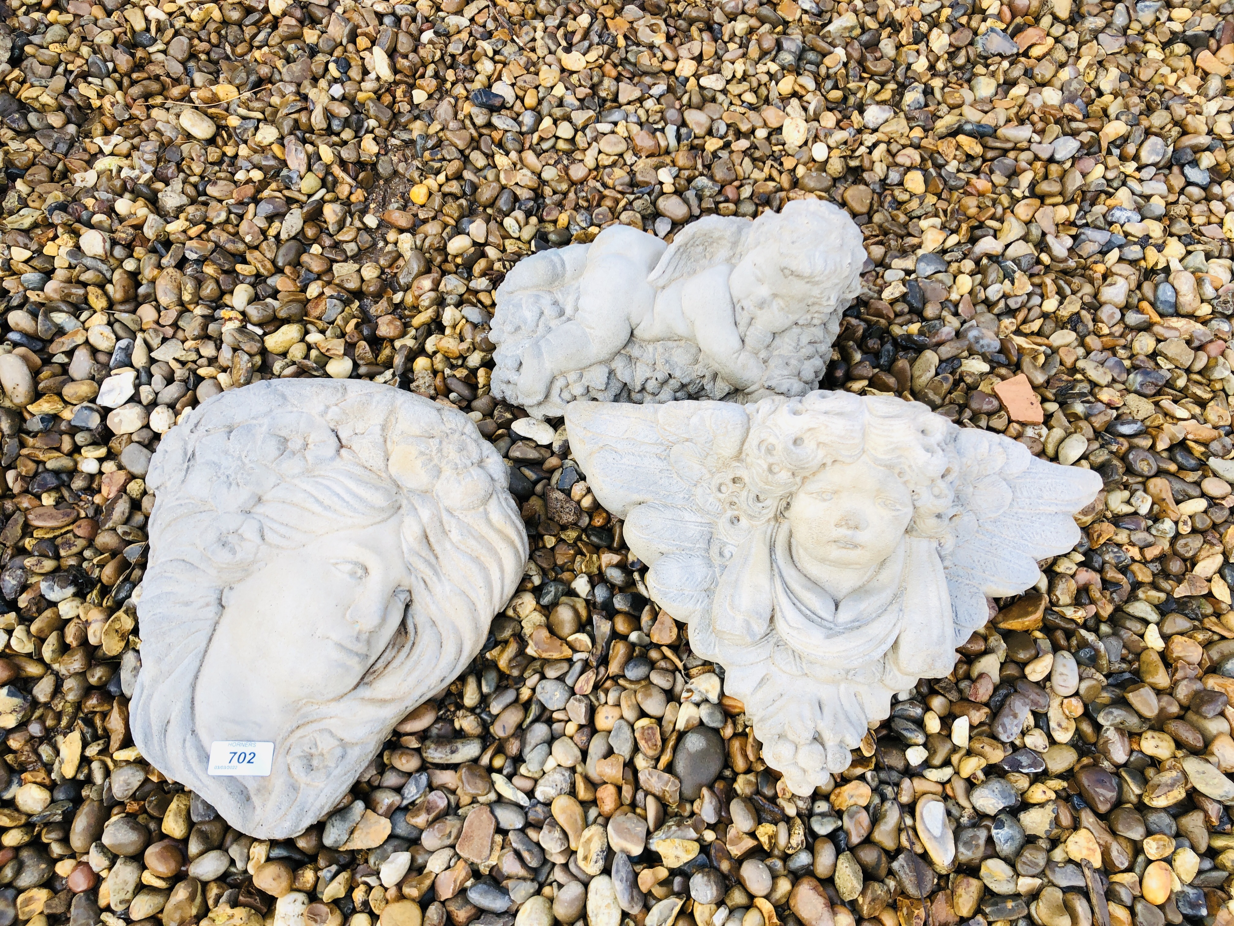 THREE STONEWORK GARDEN FEATURES TO INCLUDE CHERUB DETAILED WALL POCKET,