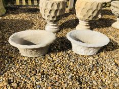 A PAIR OF OVAL STONEWORK PLANTERS WITH LATTICE DETAIL - LENGTH 50CM.