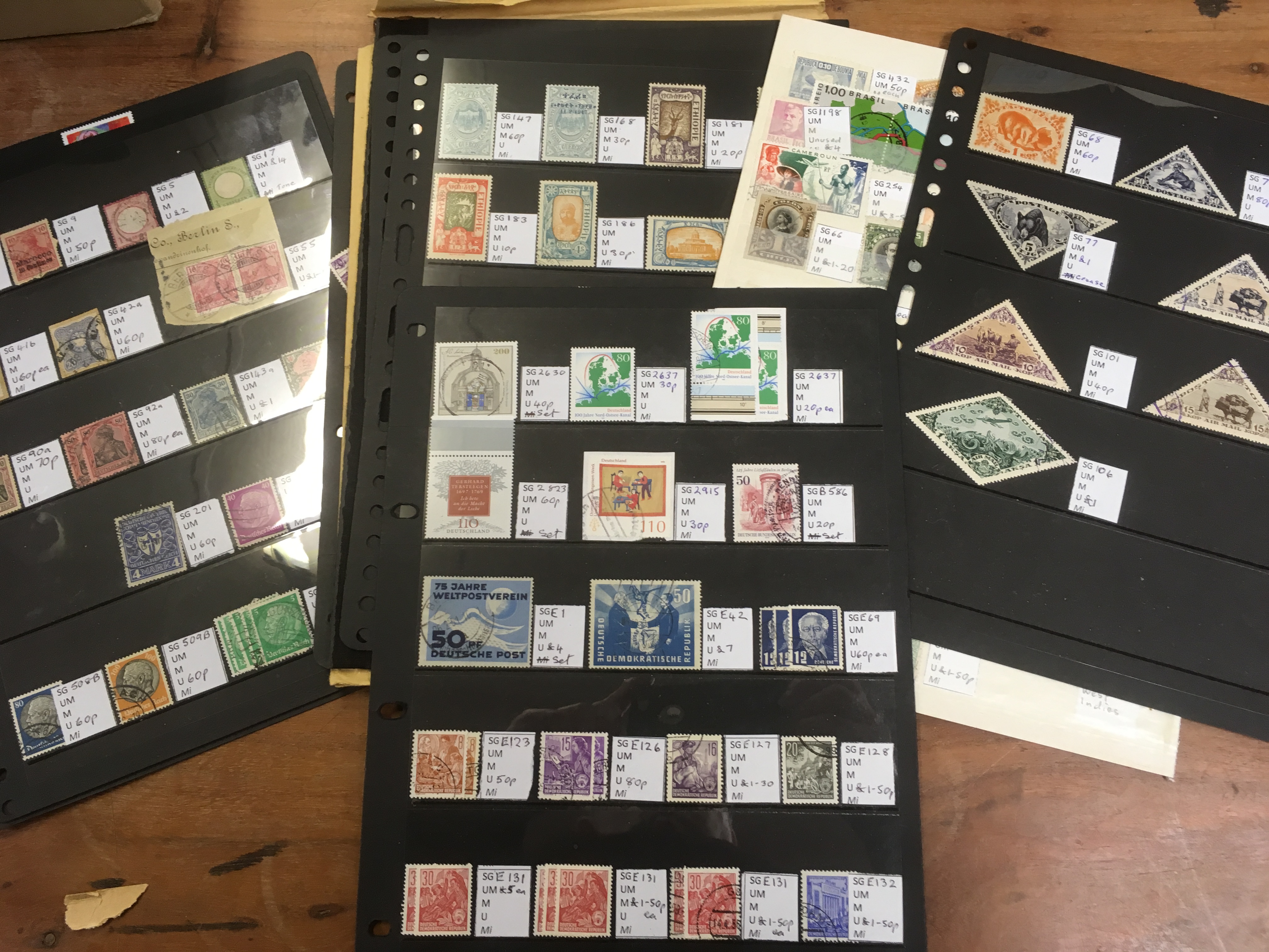BOX OF FOREIGN STAMPS ON LEAVES AND STOCKCARDS, JAPAN, SWITZERLAND, MOZAMBIQUE, PORTUGAL, - Image 2 of 3