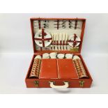 A VINTAGE SIRRAM SIX PERSON PICNIC SET IN RED TRAVEL CASE.