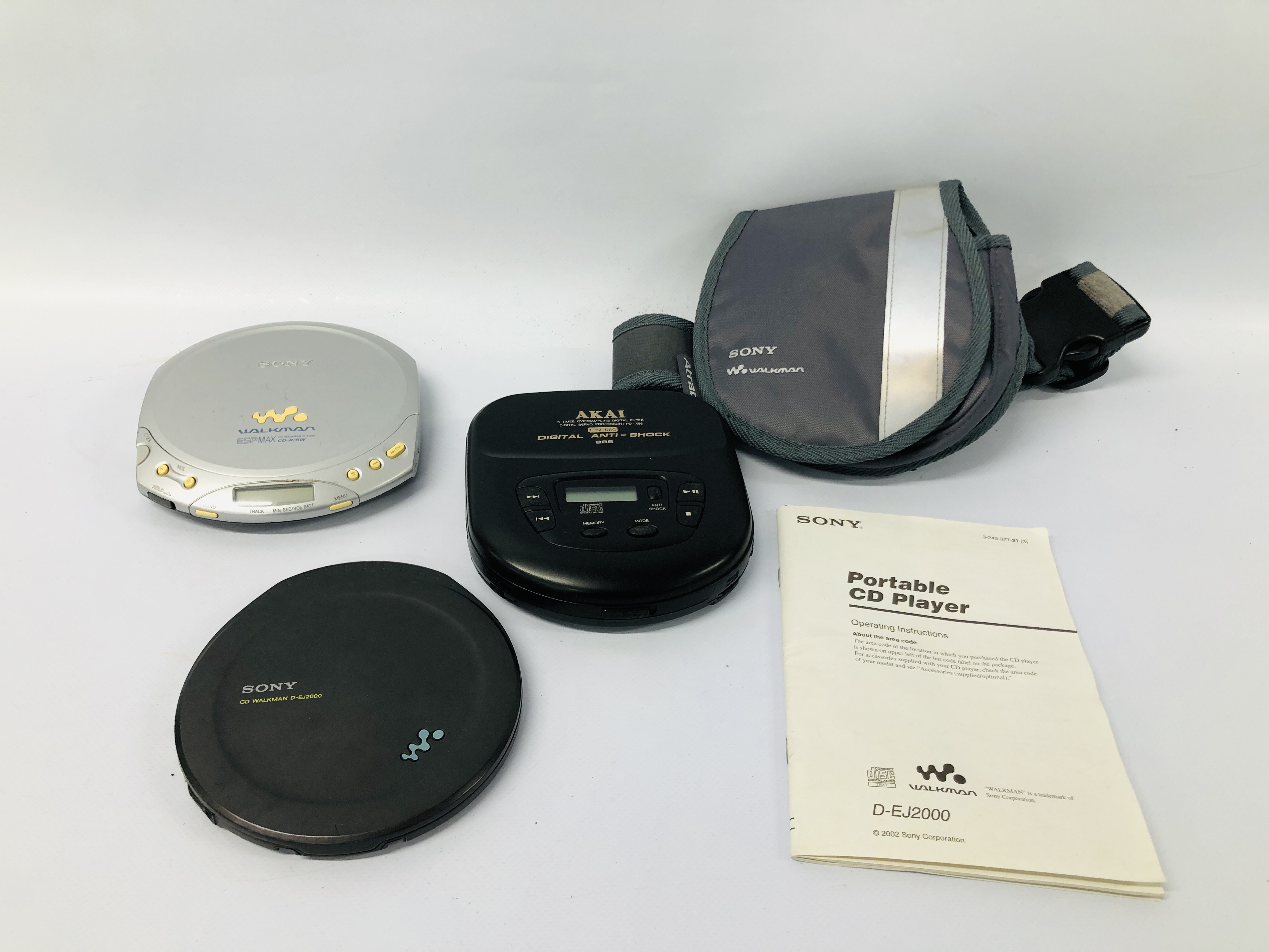 3 X WALKMANS TO INCLUDE SONY CD D-EJ2000, SONY CD ESPMAX D-E330, AKAI PD-X56 - SOLD AS SEEN.