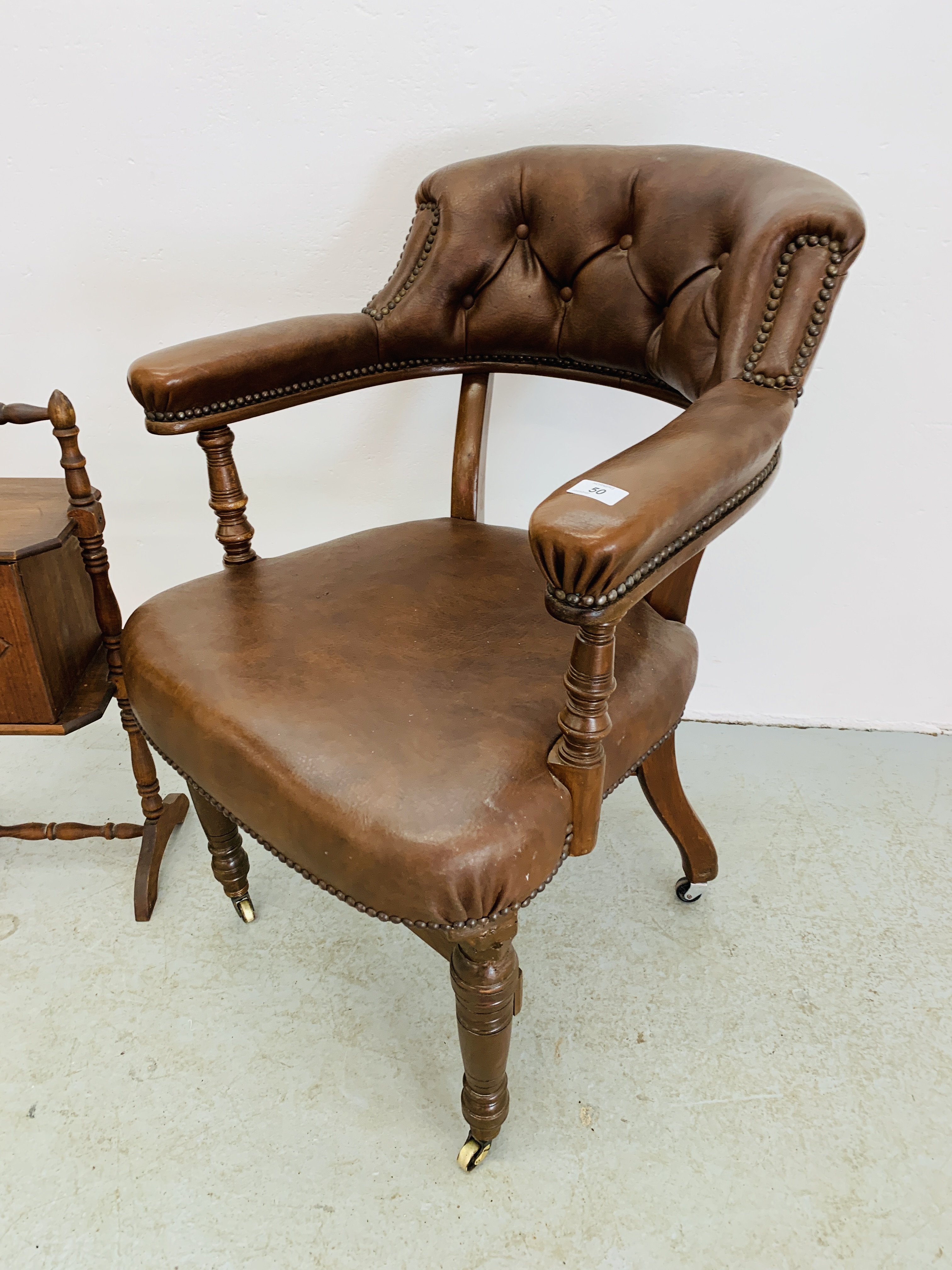 A REPRODUCTION BROWN LEATHER OFFICE CHAIR WITH STUDD DETAIL ALONG WITH A SMALL SINGLE DOOR TURNED - Image 2 of 8