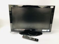 A LOGIK FLATSCREEN TELEVISION SET WITH STAND AND ACCESSORIES - SOLD AS SEEN