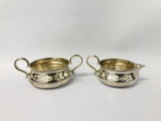 A SILVER CREAM AND SUGAR BOWL OF MATCHING DESIGN