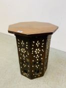 AN OCTAGONAL CARVED SIDE TABLE WITH MOTHER OF PEARL INLAY AND CARVED DETAIL