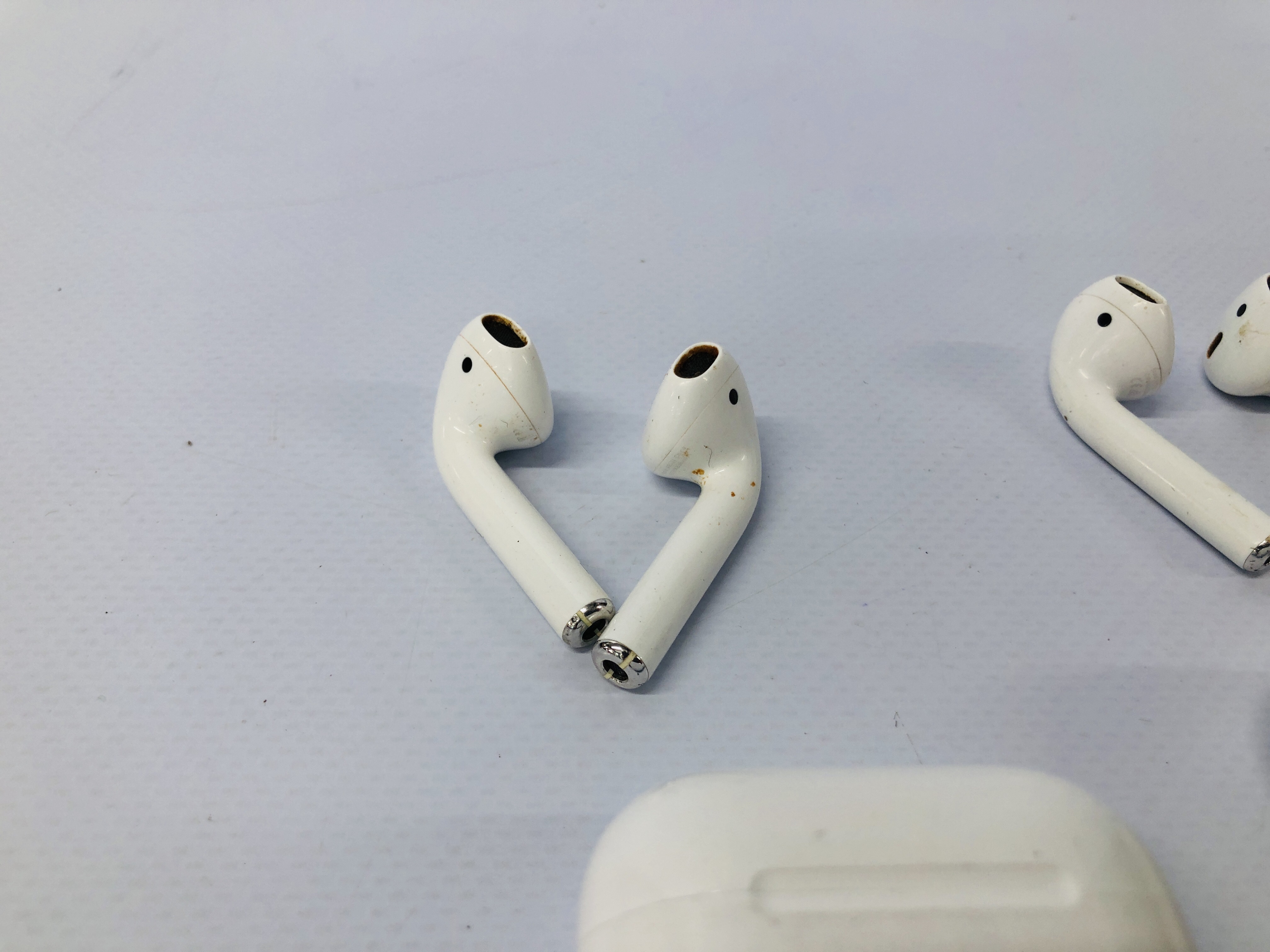 TWO PAIRS OF APPLE EAR PODS WITH CHARGING CASES - NO GUARANTEE OF CONNECTIVITY. SOLD AS SEEN. - Image 2 of 3