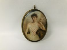 ANTIQUE OVAL HANDPAINTED MINATURE OF A YOUNG LADY H 9.5CM X W 7.5CM.