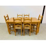 HONEY PINE DINING TABLE WITH CENTRAL SINGLE DRAWER ALONG WITH SIX LADDER BACK DINING CHAIRS (TABLE
