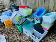 LARGE QTY OF ASSORTED PLASTIC STORAGE BOXES.