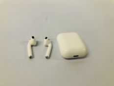 A PAIR OF APPLE EAR PODS WITH CHARGING CASE - NO GUARANTEE OF CONNECTIVITY. SOLD AS SEEN.