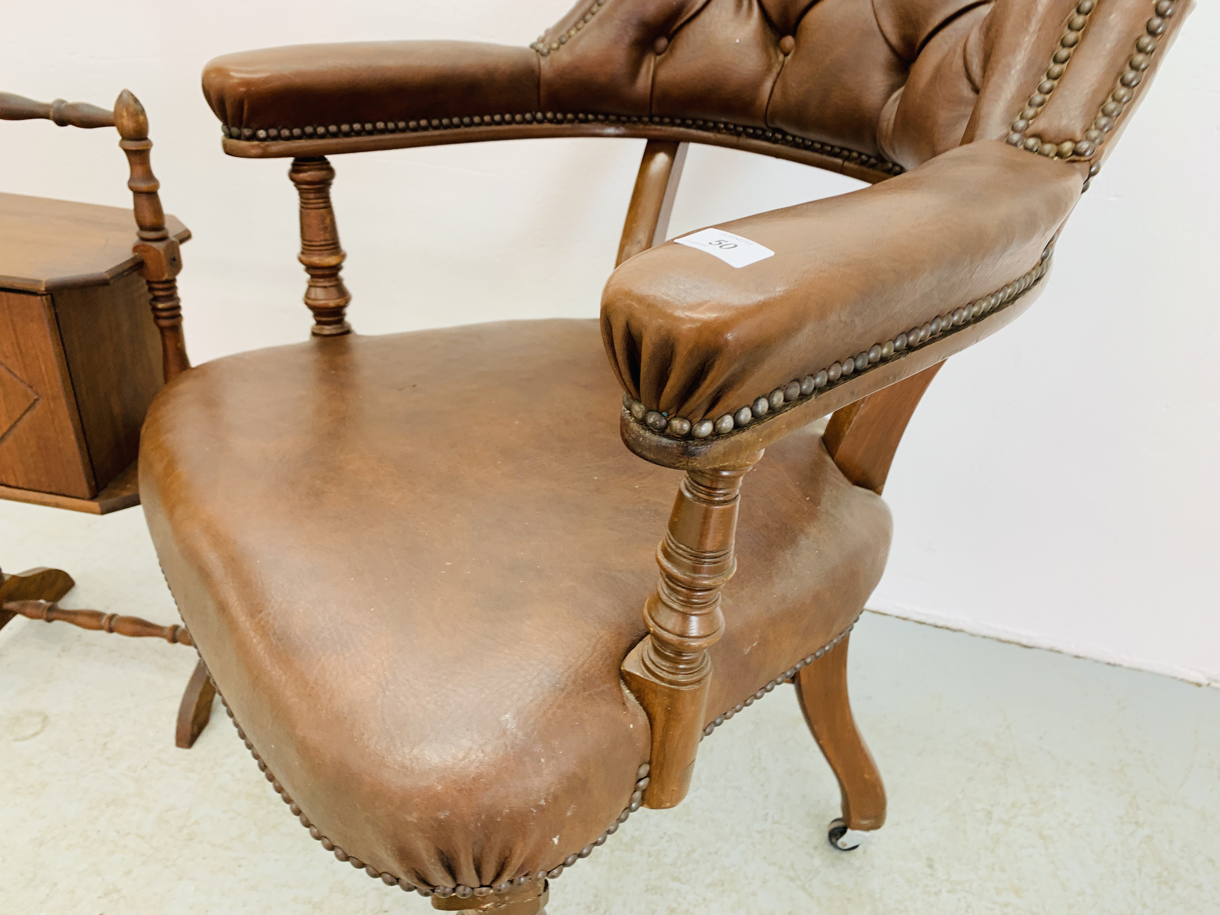A REPRODUCTION BROWN LEATHER OFFICE CHAIR WITH STUDD DETAIL ALONG WITH A SMALL SINGLE DOOR TURNED - Image 4 of 8