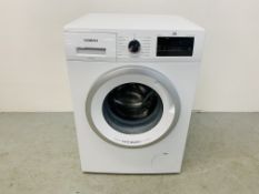 A SIEMENS ISENSORIC EXTRA CLASSE WASHING MACHINE - SOLD AS SEEN.