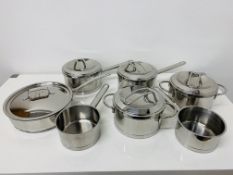 BOX OF GOOD QUALITY STAINLESS STEEL SAUCEPANS TO INCLUDE 6 DEMEYERE SAUCEPANS AND ONE HACKMAN