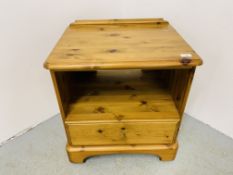 A DUCAL HONEY PINE SINGLE DRAWER BEDSIDE STAND - W 58CM. D 45CM. H 61CM.