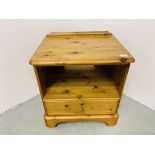 A DUCAL HONEY PINE SINGLE DRAWER BEDSIDE STAND - W 58CM. D 45CM. H 61CM.