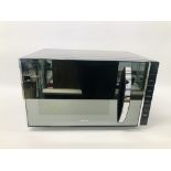 A BREVILLE MICROWAVE OVEN/GRILL - SOLD AS SEEN