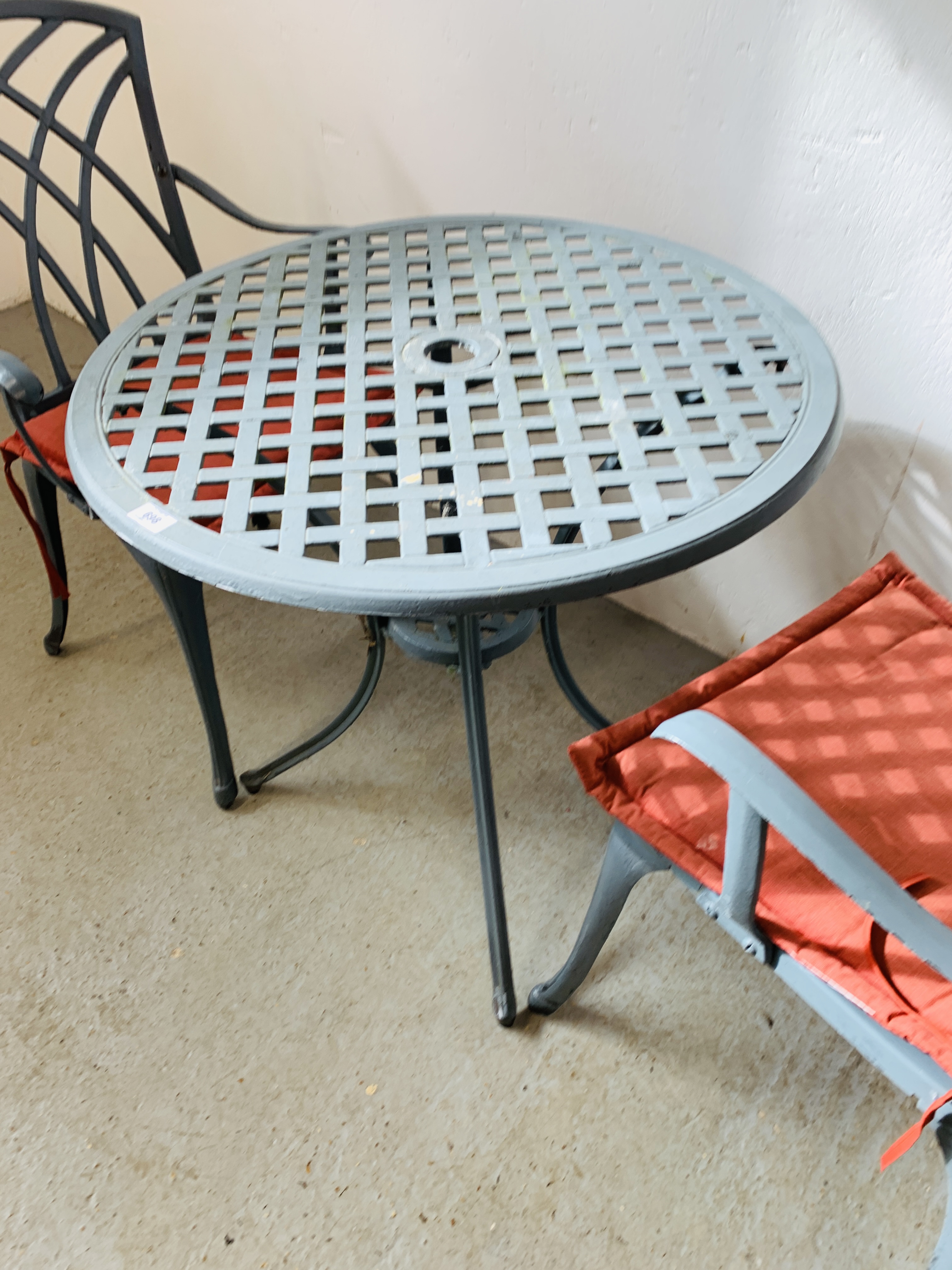 A CAST ALUMINIUM PATIO BISTRO SET COMPRISING CIRCULAR TABLE AND TWO CHAIRS WITH SEAT CUSHIONS - Image 4 of 6