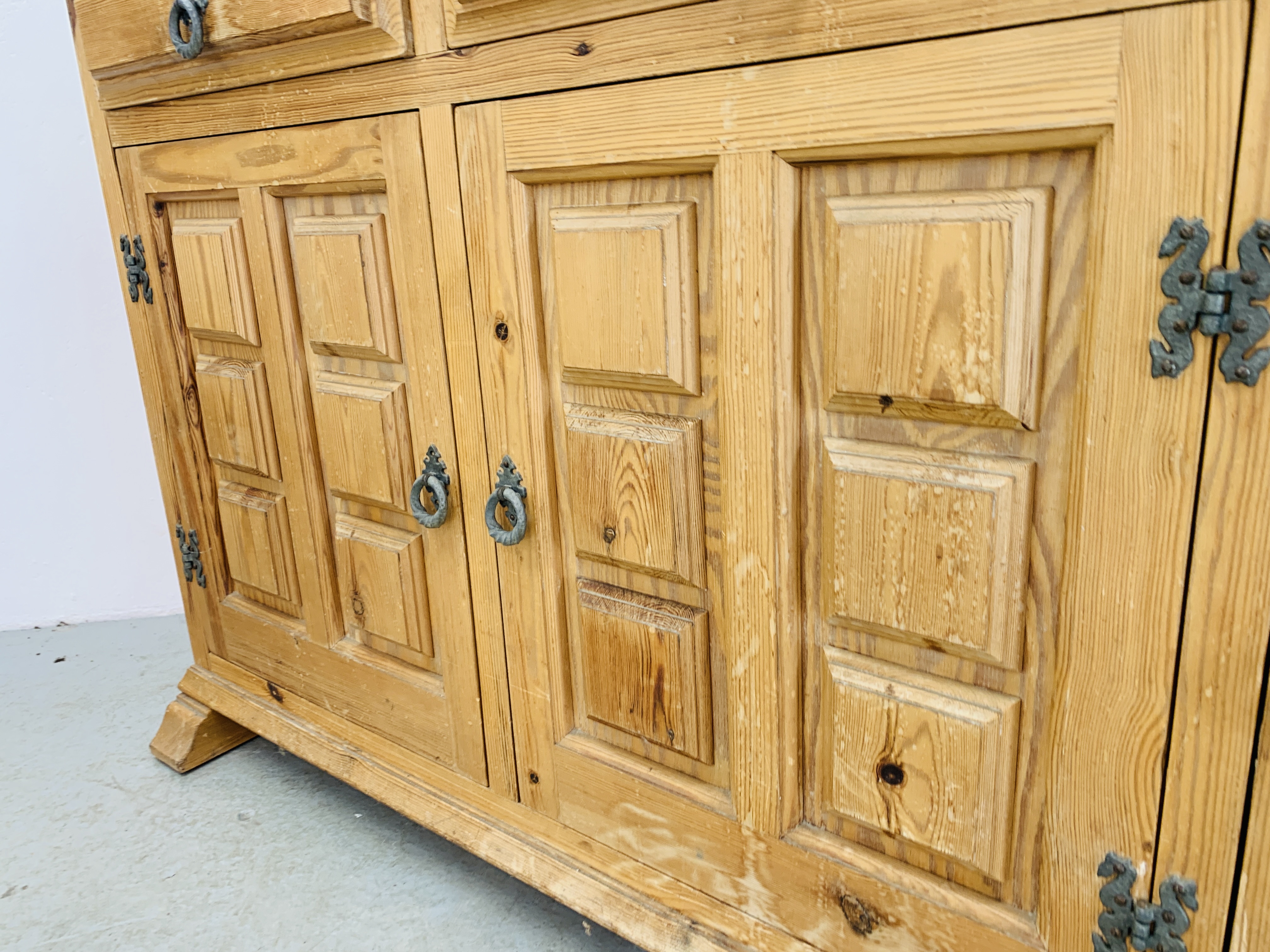 A THREE DRAWER THREE DOOR PINE SIDEBOARD WITH DECORATIVE PANEL DETAIL - Image 8 of 9