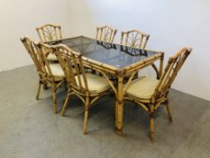 A BAMBOO FRAMED DINING SET - THE RECTANGULAR DINING TABLE WITH SMOKED GLASS TO TOP 160 X 85 CM.