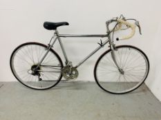 A CHROME FRAMED 12 SPEED BICYCLE