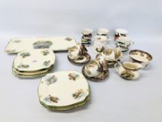 WILKINSON ROYAL STAFFORDSHIRE FISH DECORATED PLATES,