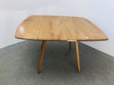 A BLONDE ERCOL DROP DINING TABLE