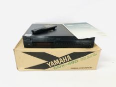 A YAMAHA NATURAL SOUND COMPACT DISC PLAYER MODEL CDX-490 WITH REMOTE,