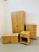 A MODERN FOUR PIECE PINE FINISH BEDROOM SUITE COMPRISING OF DOUBLE DOOR WARDROBE WITH DRAWER,