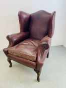 ANTIQUE BROWN LEATHER FIRESIDE CHAIR WITH STUD DETAIL