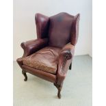 ANTIQUE BROWN LEATHER FIRESIDE CHAIR WITH STUD DETAIL