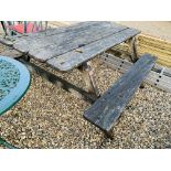 A HARDWOOD PICNIC BENCH.