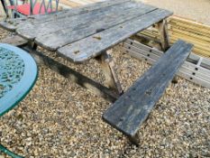 A HARDWOOD PICNIC BENCH.