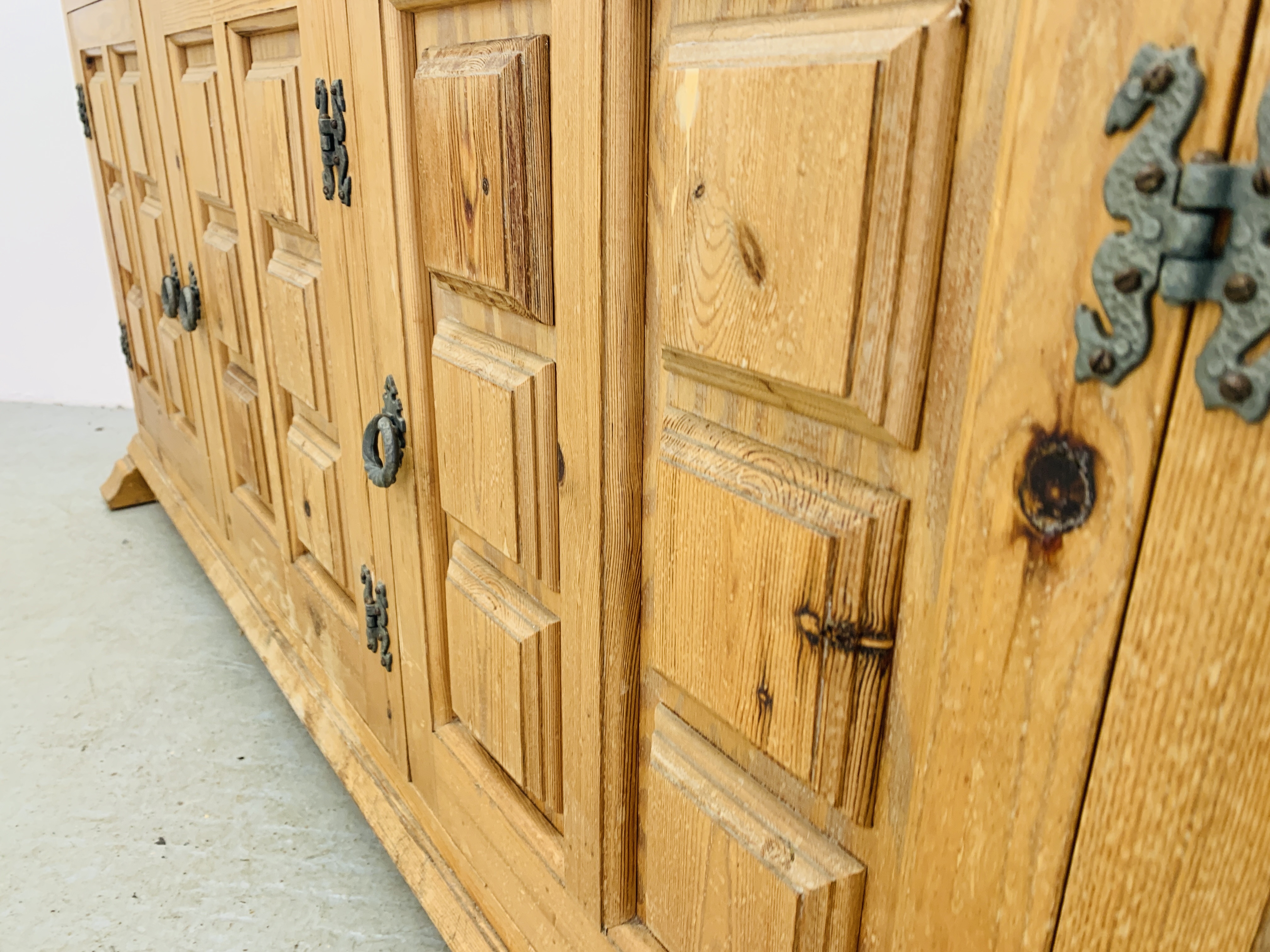 A THREE DRAWER THREE DOOR PINE SIDEBOARD WITH DECORATIVE PANEL DETAIL - Image 7 of 9