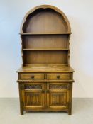 A SMALL TRADITIONAL ARCH TOP COTTAGE DRESSER THE BASE WITH TWO DRAWERS AND TWO CUPBOARD DOORS WIDTH