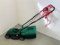 A QUALCAST COMPACT ELECTRIC LAWN MOWER WITH GRASS COLLECTOR - SOLD AS SEEN