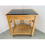 A TWO DRAWER KITCHEN WORKSTATION WITH SOLID GRANITE PREPARATION TOP, WHEELED.