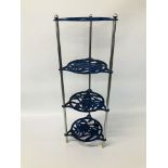 A DECORATIVE CAST IRON FOUR TIER KITCHEN PAN STAND.