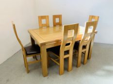 A SOLID LIGHT OAK EXTENDING RECTANGULAR DINING TABLE WITH SIX SOLID LIGHT OAK DINING CHAIRS WITH