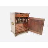 A VINTAGE MAHOGANY APOTHECARY CABINET WITH SLIDES AND VARIOUS BOTTLES ETC W 28CM, D 24CM, H 38CM.