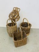 A GROUP OF THREE VINTAGE WICKER BASKETS AND TWO CARPET BEATERS.