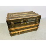 A VINTAGE METAL BOUND TRUNK 88CM X 49CM X 53CM.