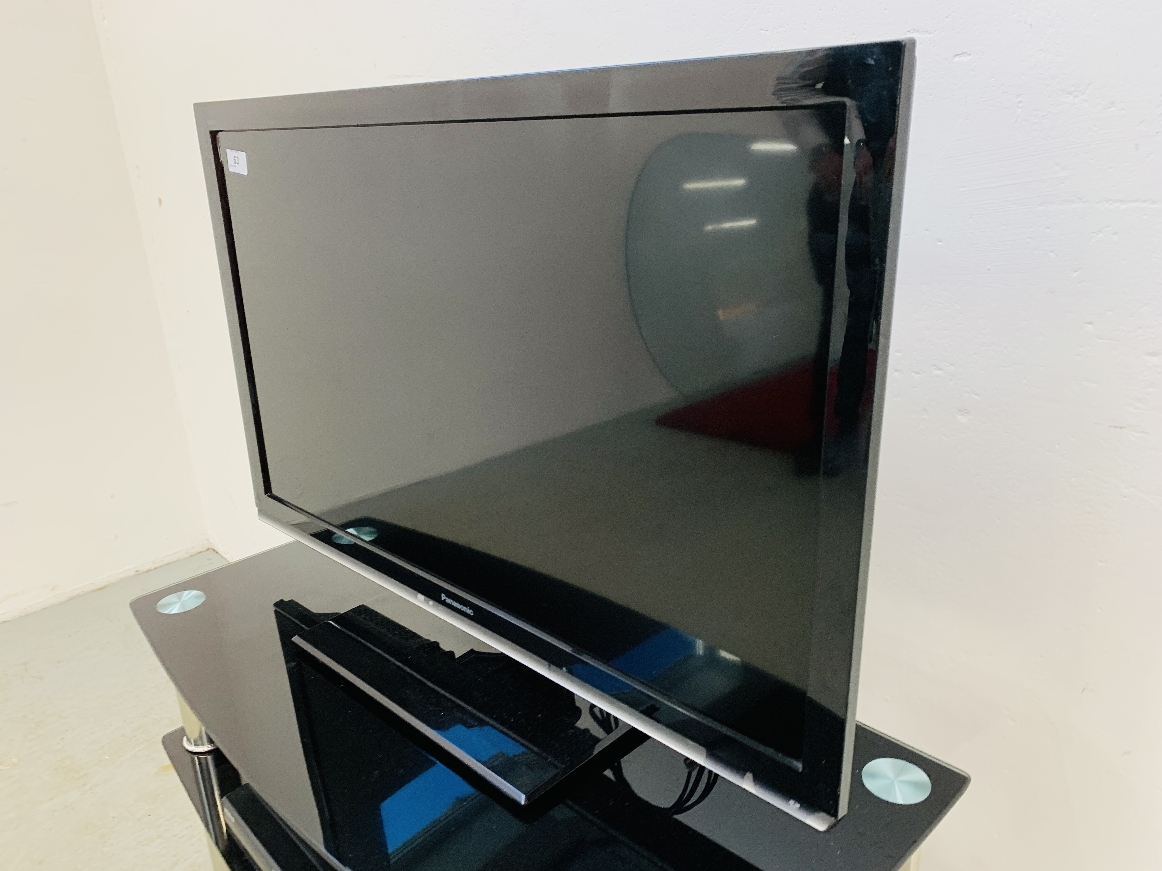 A PANASONIC VIERA 32 INCH TELEVISION WITH REMOTE ON GLASS THREE TIER STAND + HUMAX HD RECORDER WITH - Image 2 of 8